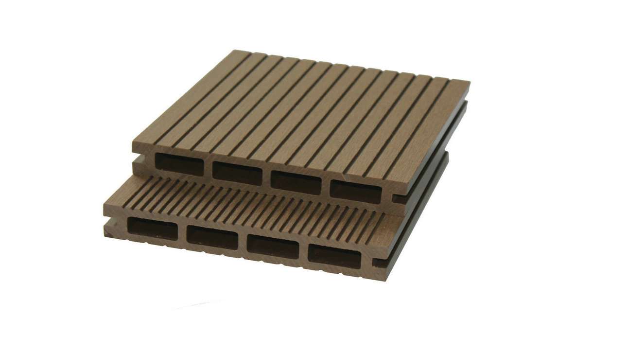 Overhead flat-lay of light brown composite boards arranged in a fan on a white surface